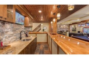 basement remodel with traditional wood accents | Low basement ceilings
