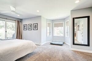 owner's suite with bay window and carpet | fbc remodel