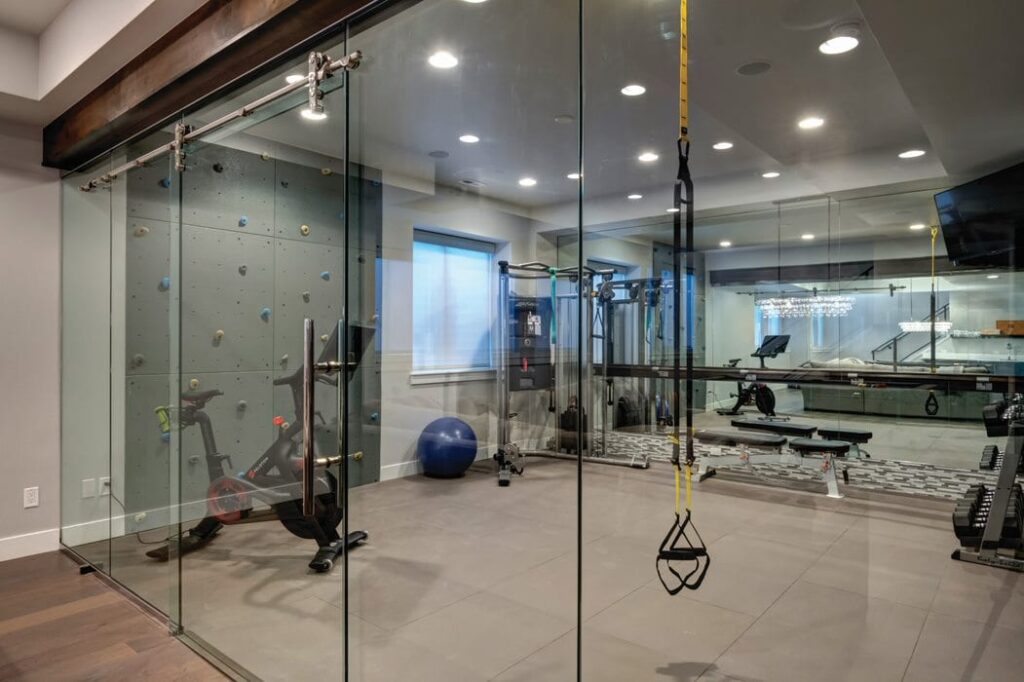 HOME GYM | ROCK WALL AT HOME | glass door home gym | fbc remodel