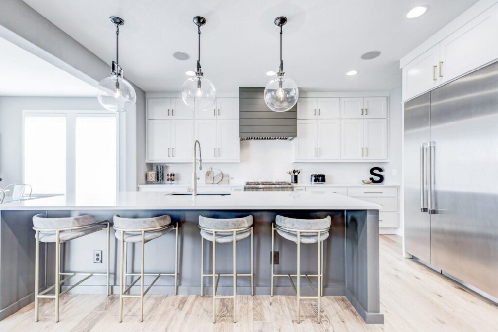 white kitchen | pendant lights | modern sleek kitchen remodel | fbc remodel