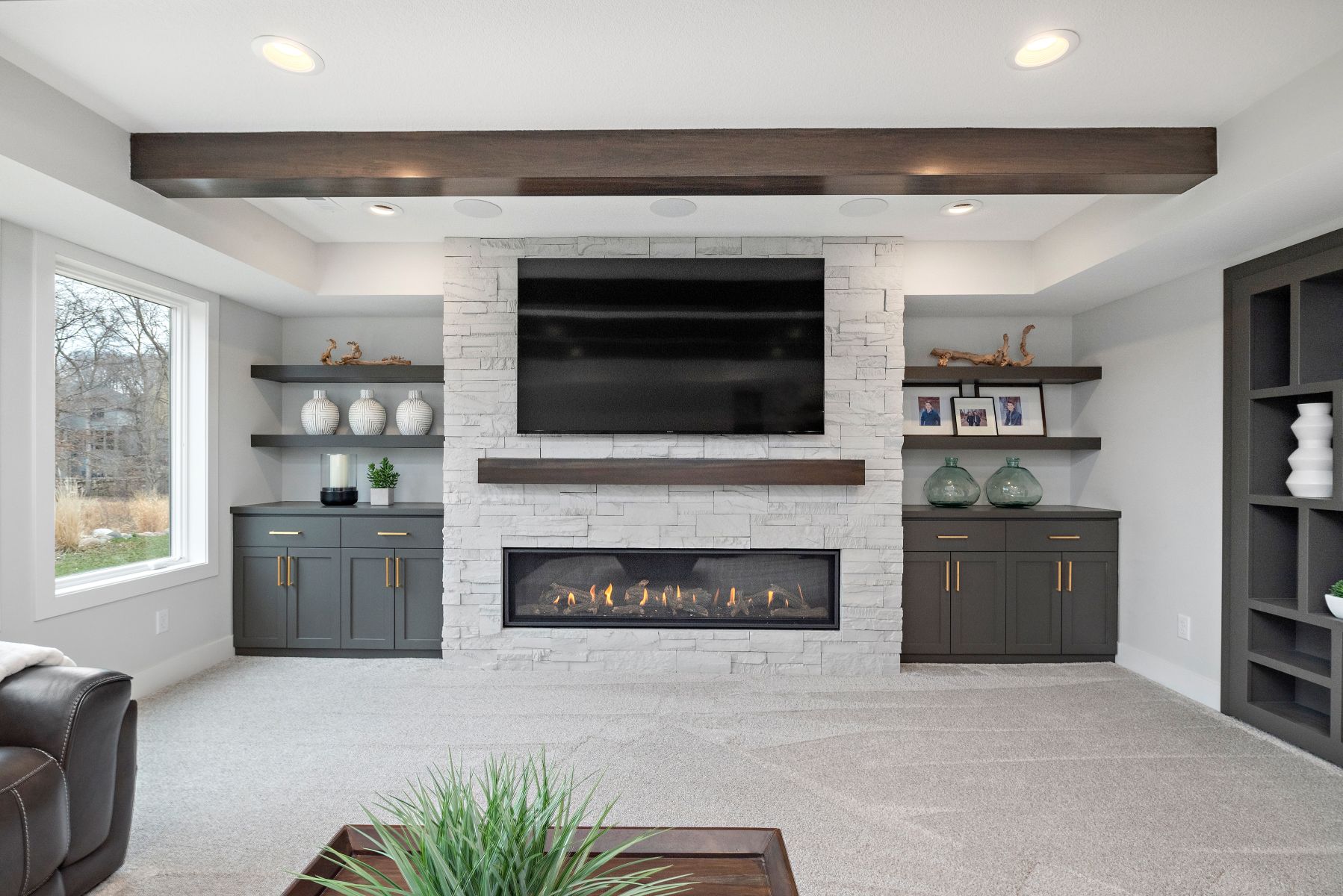 Transitional Basement Finish | Living Room, Fireplace, Ceiling Beams | FBC Remodel