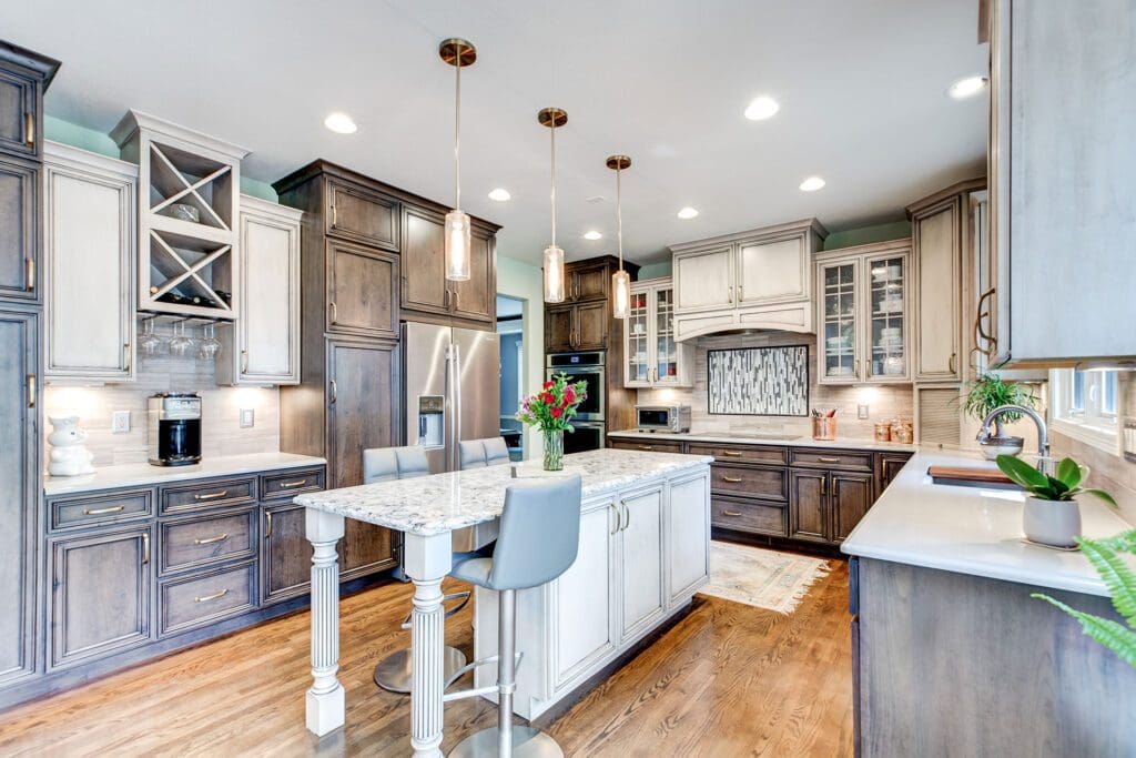 Warm, inviting kitchen with rich wooden cabinetry and modern accents.