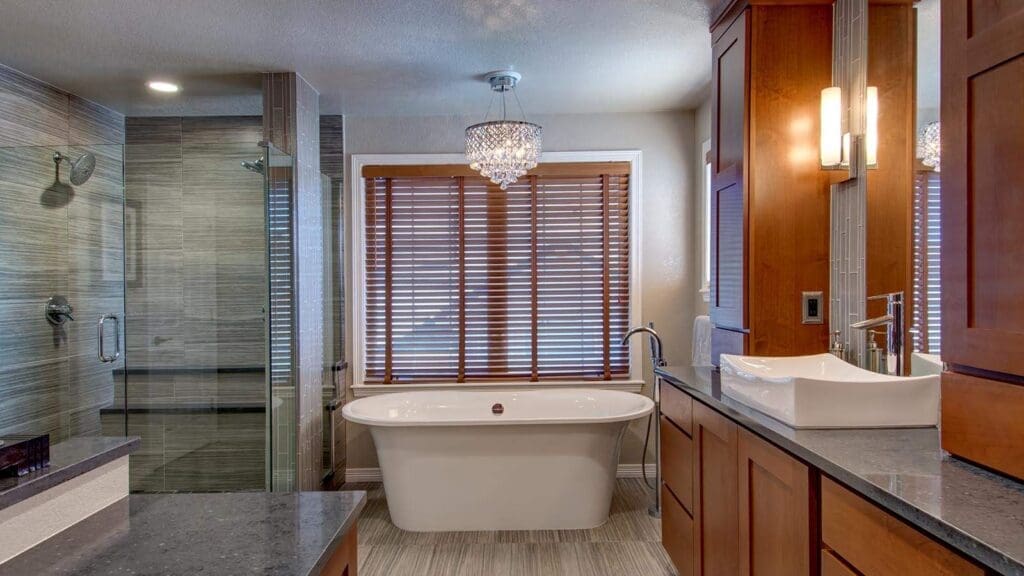 Spa-style bathroom with freestanding tub and glass shower