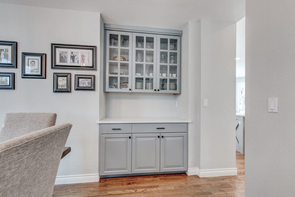 Built-in china cabinet with glass doors and dishware display