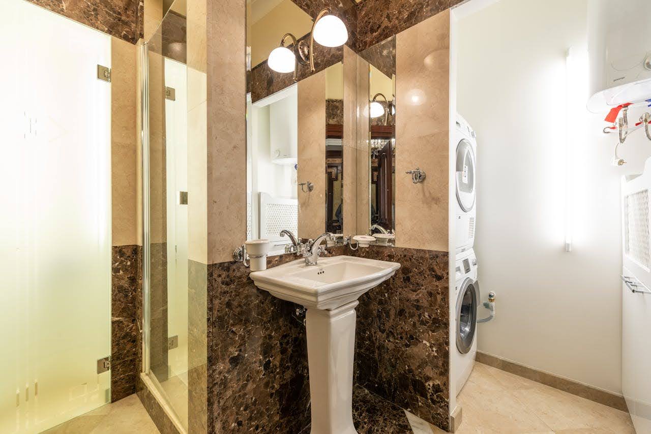 A picture of a corner sink - which could be perfect for small bathroom ideas.